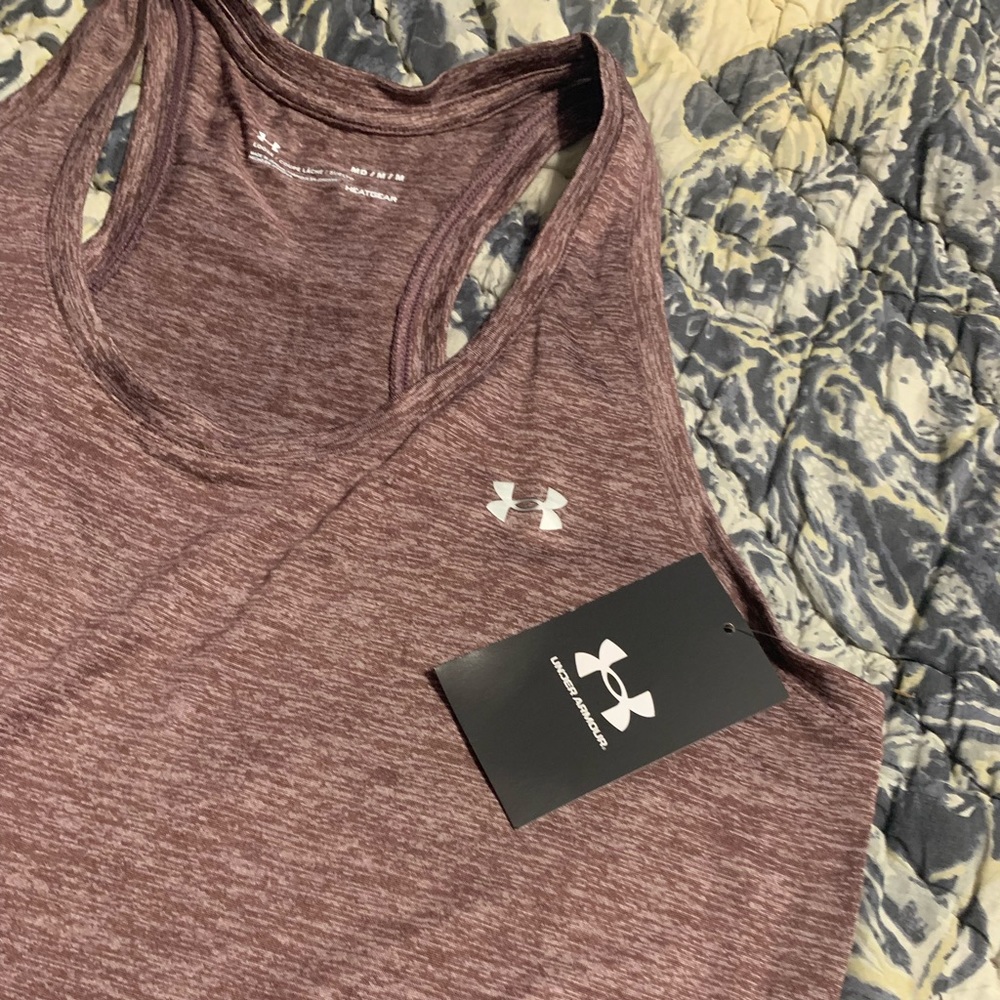Under Armour  loose fit heat gear tank top.  Size Md